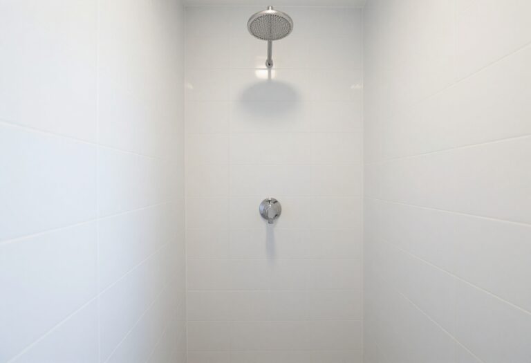 Clean shower tiles with bright white grout