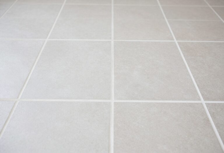 Clean tile floor with bright grout lines after cleaning