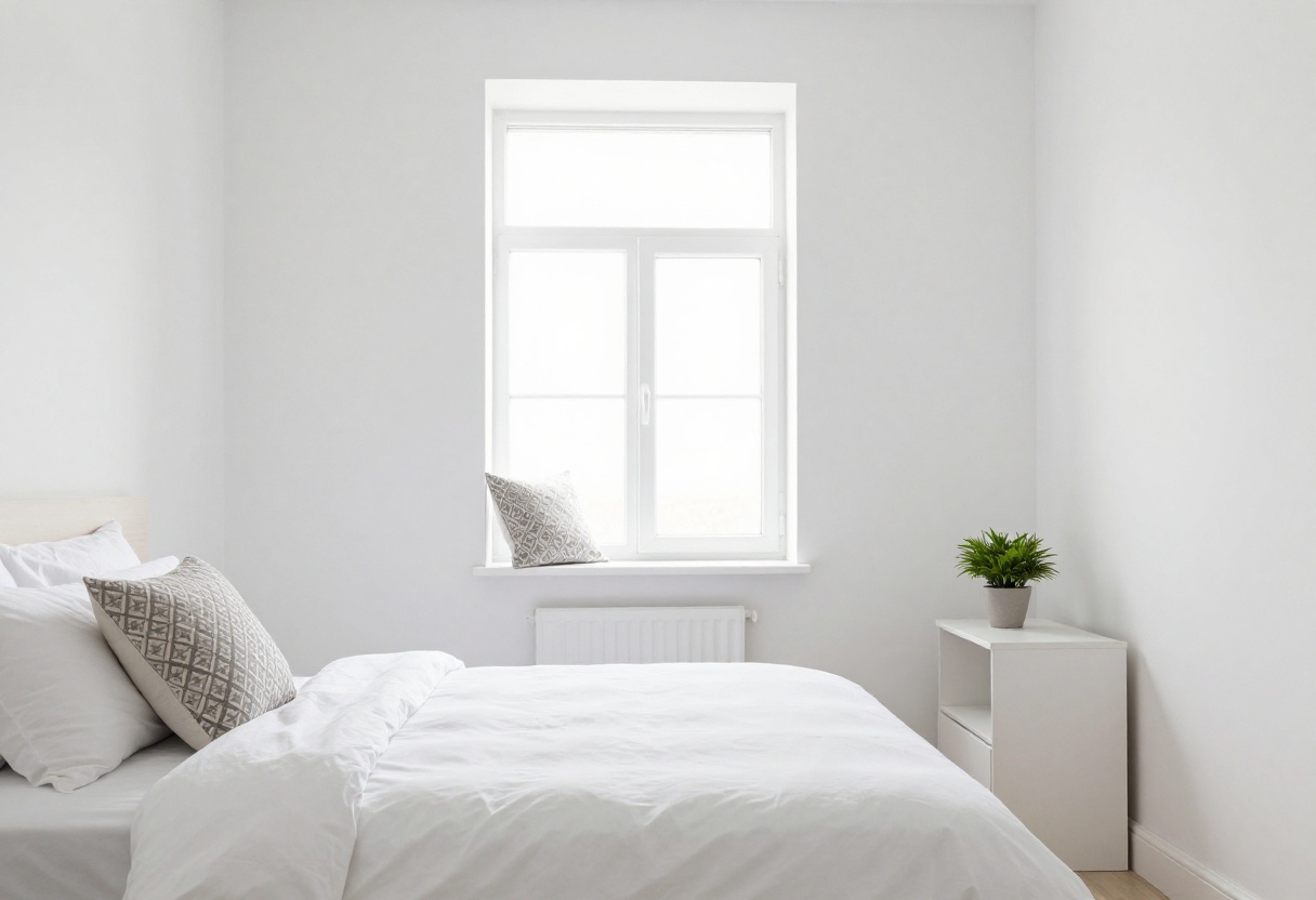 Clean and fresh bedroom with white linens and natural light