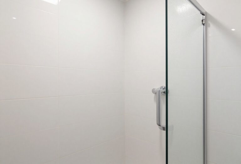 Sparkling clean shower tile and glass door after soap scum removal