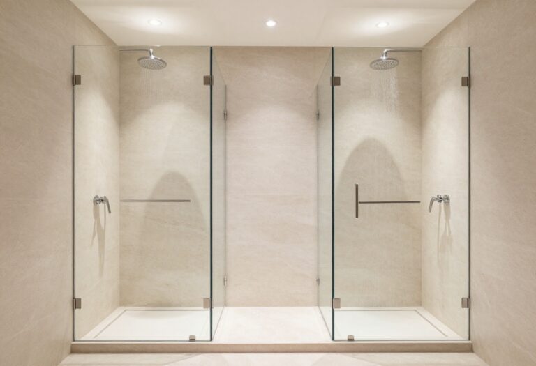 Modern double shower with two rainfall heads in a bright bathroom